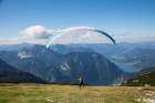 Austria-Dachstein-Paragliders as they prepare to take off above Lake Hallstatt Art Print